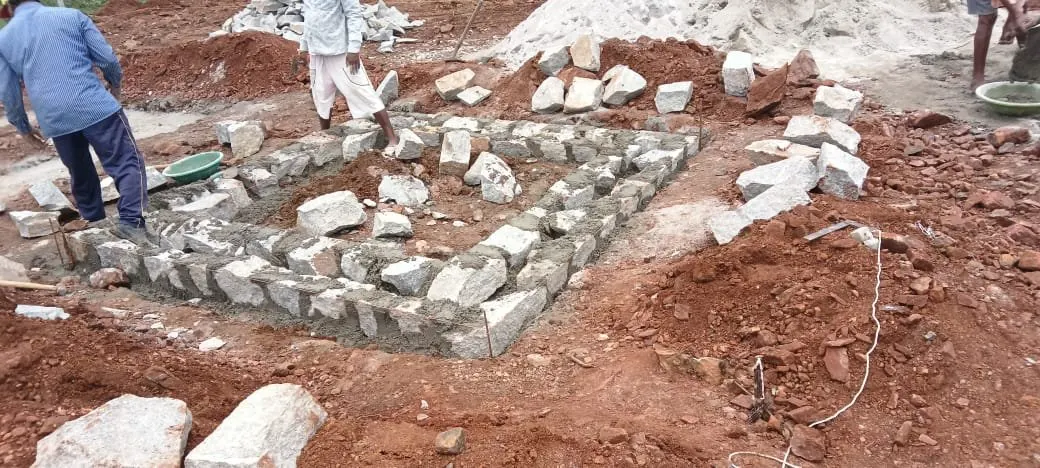 Stone masonry foundation rises